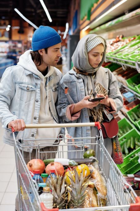 two-shoppers-in-grocery-store-stock-photo