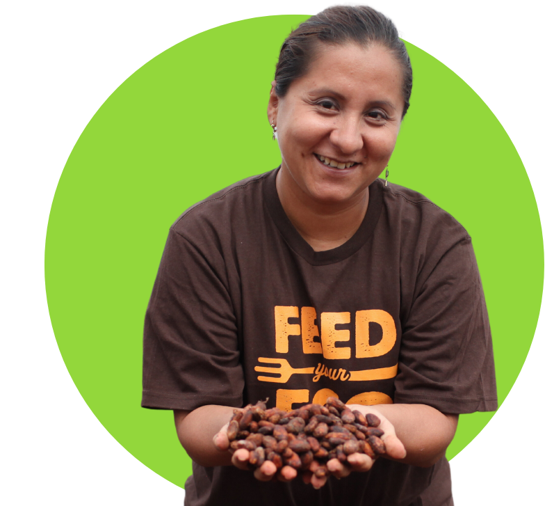 woman holding coffee beans