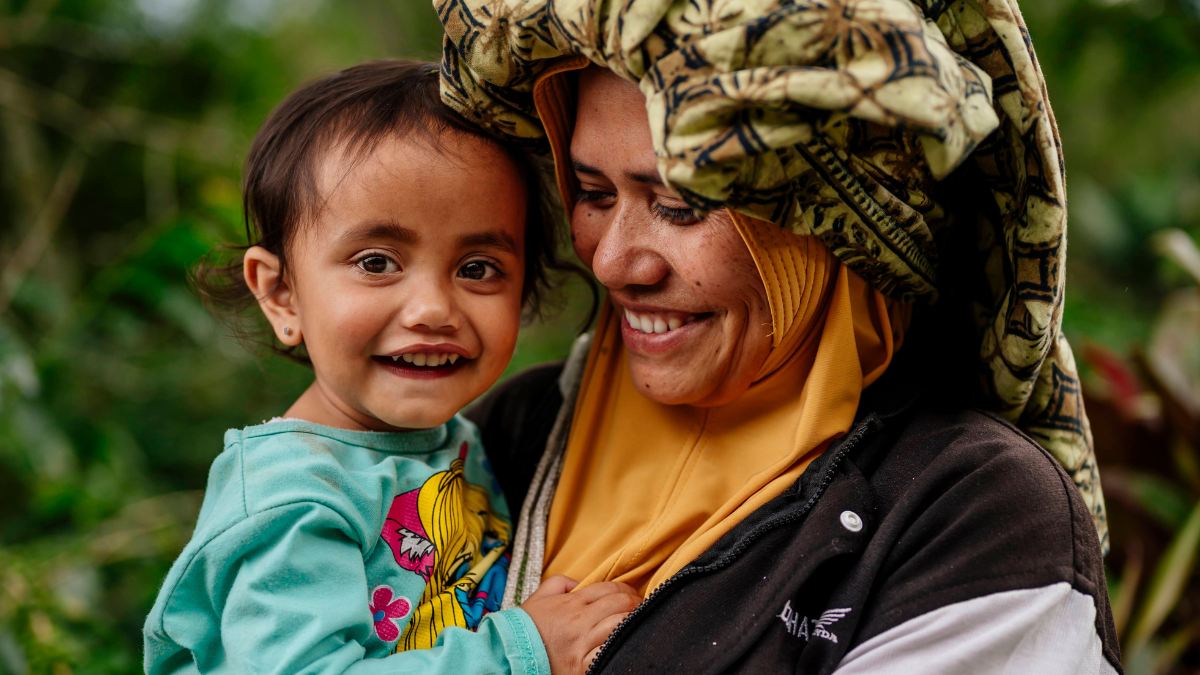 Mother holding child