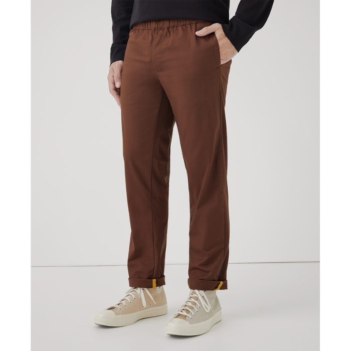 Man wearing Pact's Woven Twill Roll Up Pant