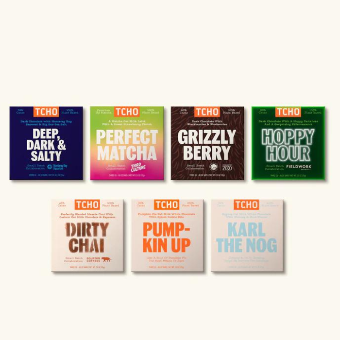 A collection of TCHO's small batch chocolate. Contains one bar each of Deep, Dark & Salty; Perfect Matcha; Grizzly Berry; Hoppy Hour; Dirty Chai; Pumpkin Up; and Karl the Nog.