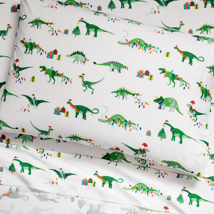 Children's bed sheets featuring dinosaurs that glow in the dark.